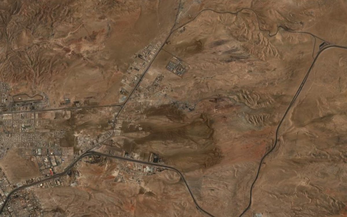 Satellite view of discarded clothing dumps in the Atacama Desert near Alto Hospicio, Chile